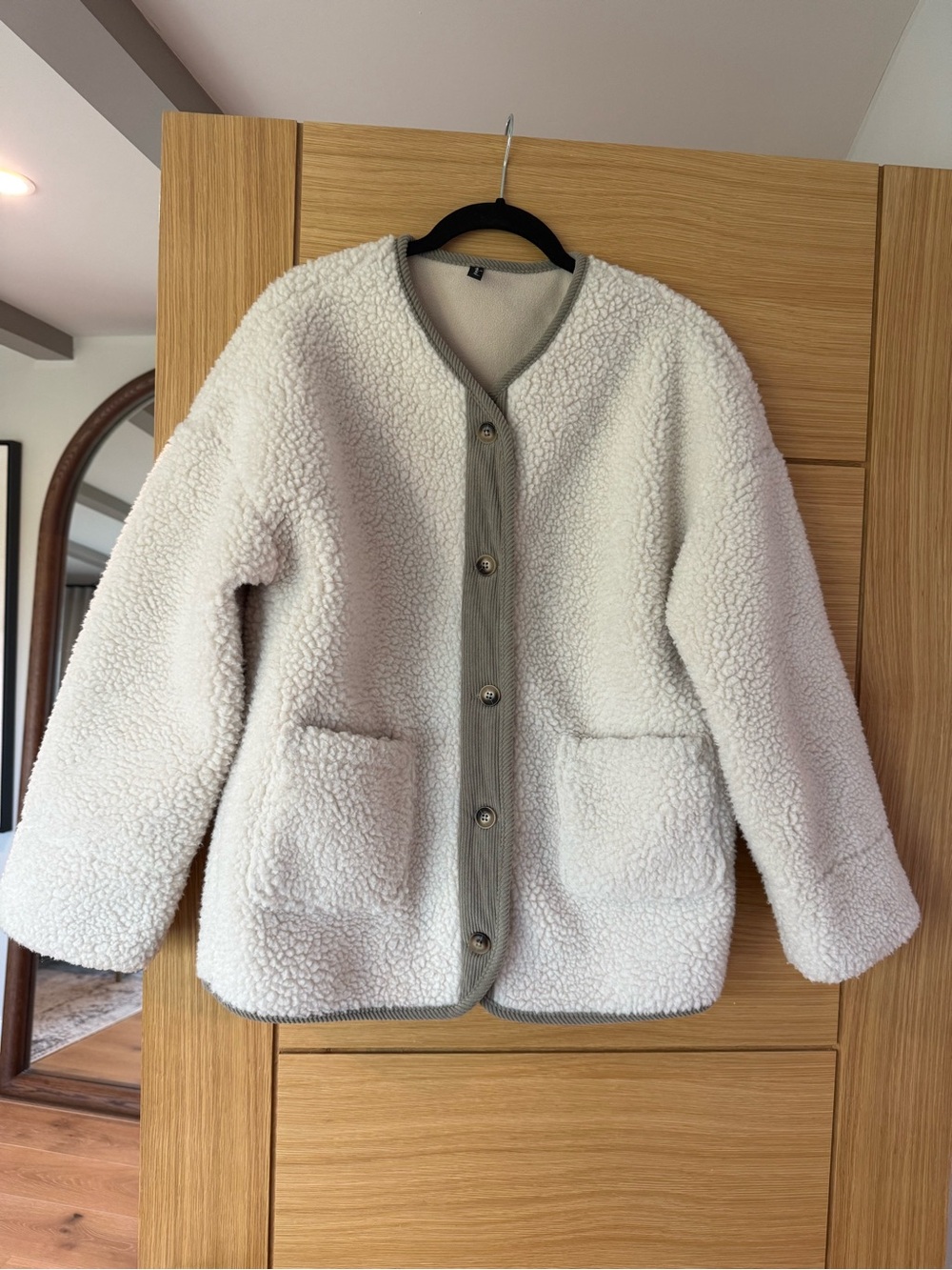 Fleece jacket with corduroy trim